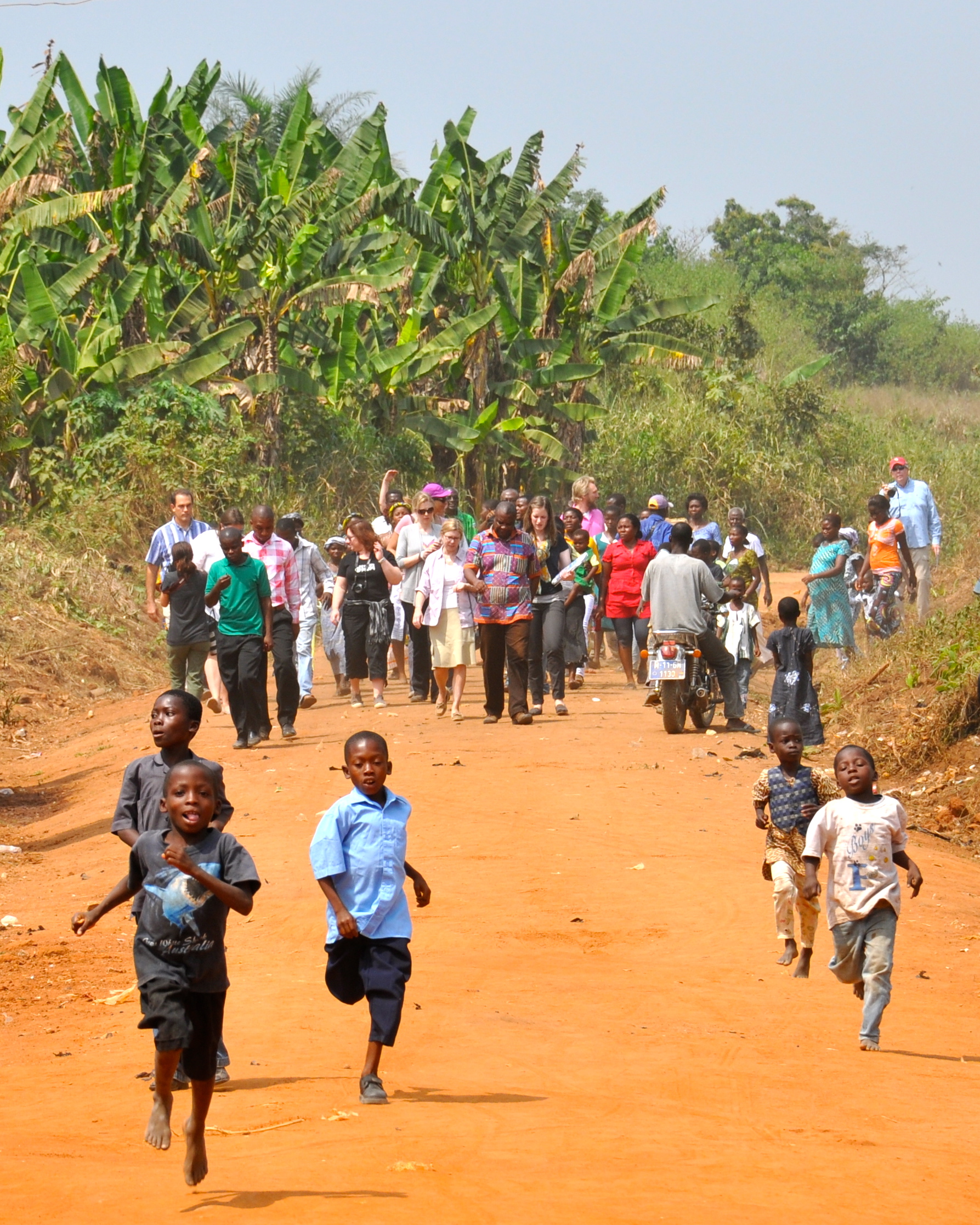 Community members walking to a water point in Ghana
