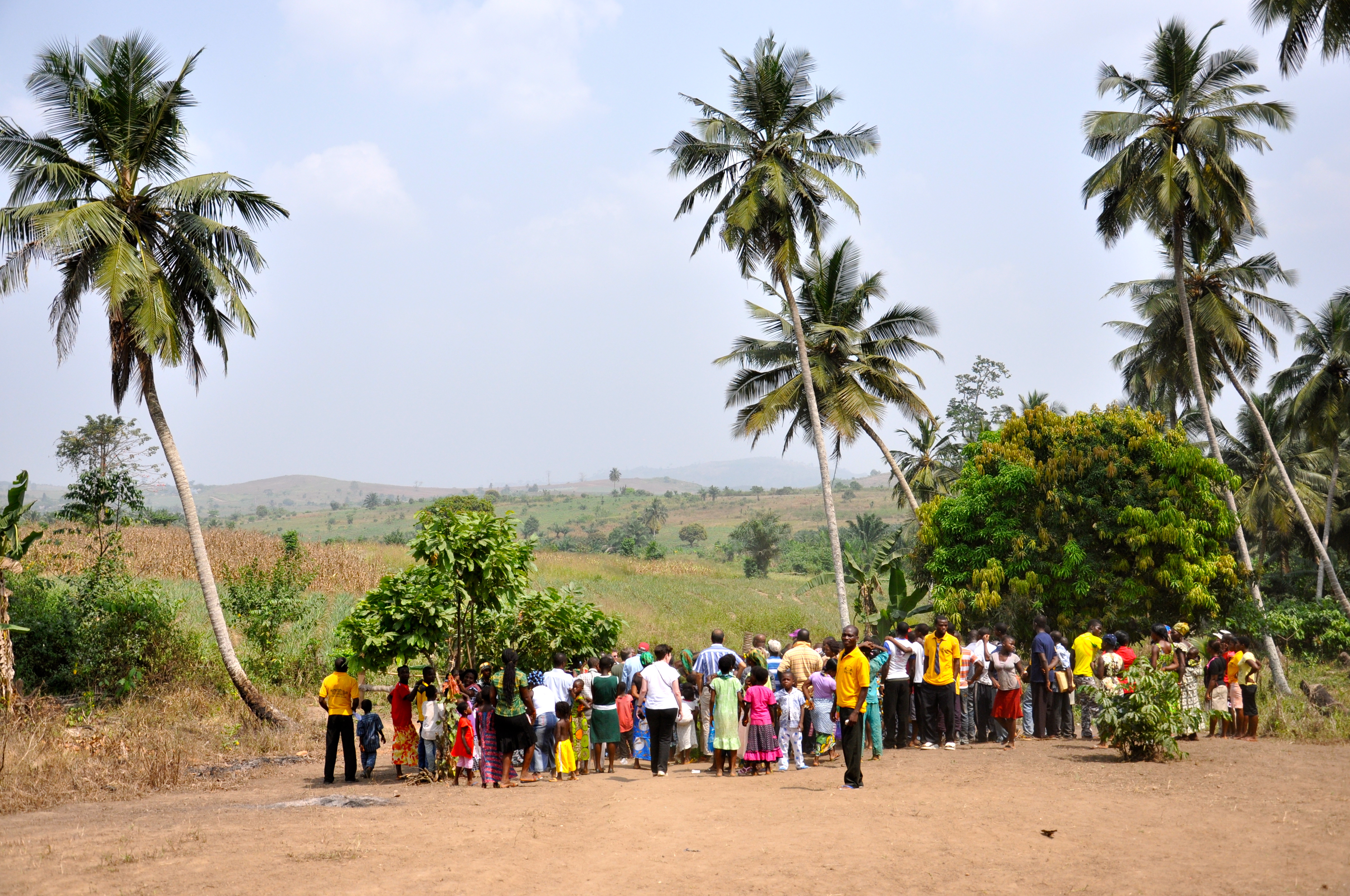 Community members at a water station in Ghana
